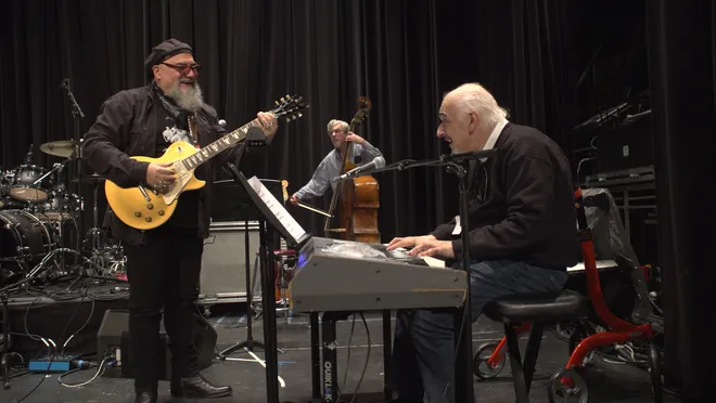 Jimmy Vivino and Lee Shapiro playing music in the documentary Banded Together